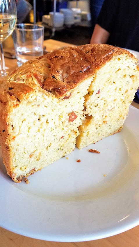 Meadlowlark Portland Dinner No #30 April 22, 2018 All the dinners of this pop up supper club for social justice always benefit a cause and the food and drink emphasize rustic, handcrafted cuisine and local ingredients. Here, for this dinner one of the highlights was the giant loaves of housemade casatiello, a traditional bread studded with cheese and cured meat - pancetta, cacio di roma, and green garlic