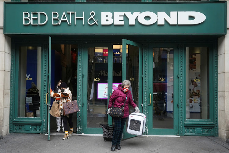 People walk out of Bed Bath & Beyond in the Manhattan borough of New York City, the US. Picture: REUTERS/CARLO ALLEGRI