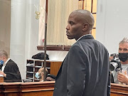 Parliament arson accused Zandile Mafe was clean-shaven and wearing a suit in the Cape Town magistrate's court on Tuesday, in contrast to his dishevelled appearance last week.