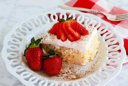 A slice of Cheater's Tres Leches Cake on a plate.