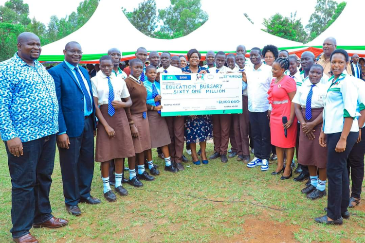 Homa Bay Governor Gladys Wanga and Kasipul MP Ongondo Were during disbursement of cheques worth Sh61m at Agoro Sare Primary in Oyugis town on March 28, 2024.