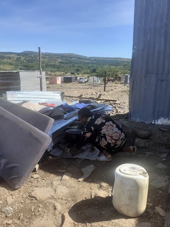 Informal settlement resident Evelyn Masuvhelele shows the TimesLIVE team where she cooks for her family.