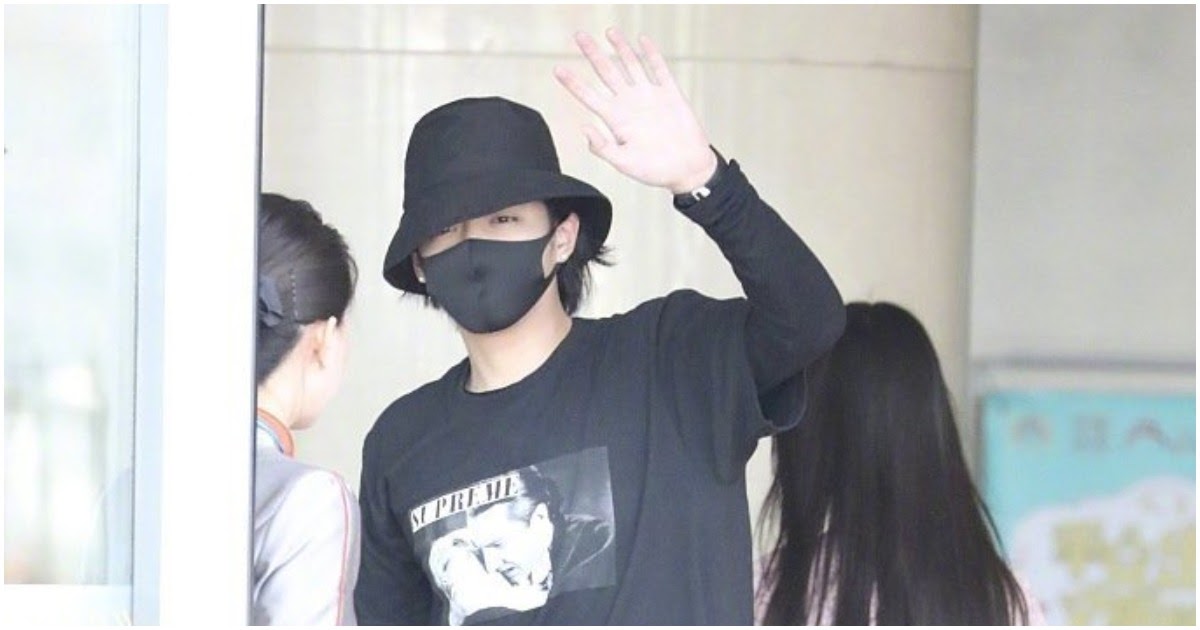 Spotted: Former EXO member Kris Wu holding hands with a mystery