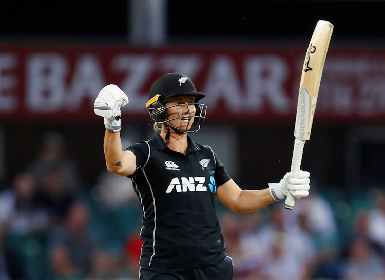 New Zeland's Sophie Devine celebrates scoring the winning runs.