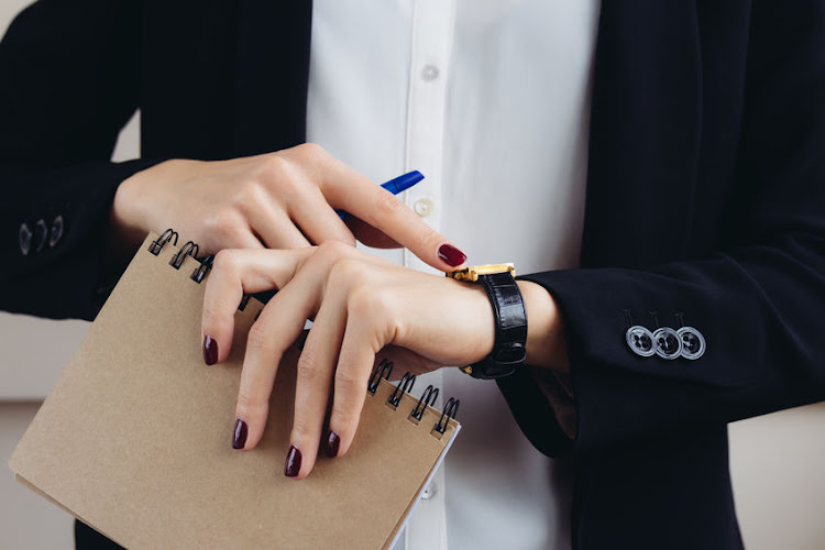 The victim was relieved of her watch and jewellery while seated at an outside table. Stock photo.