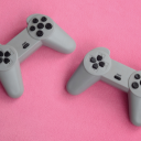 Black and White PS5 Controller on a Sky Blue Background
