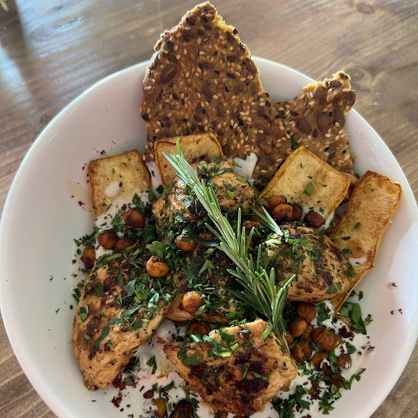 Blacken Cajun Fettah.  You will want to ask for a spoon and get every last bite.  Served with homemade 5 seeded bread. Cajun chicken peas and blacken chicken.