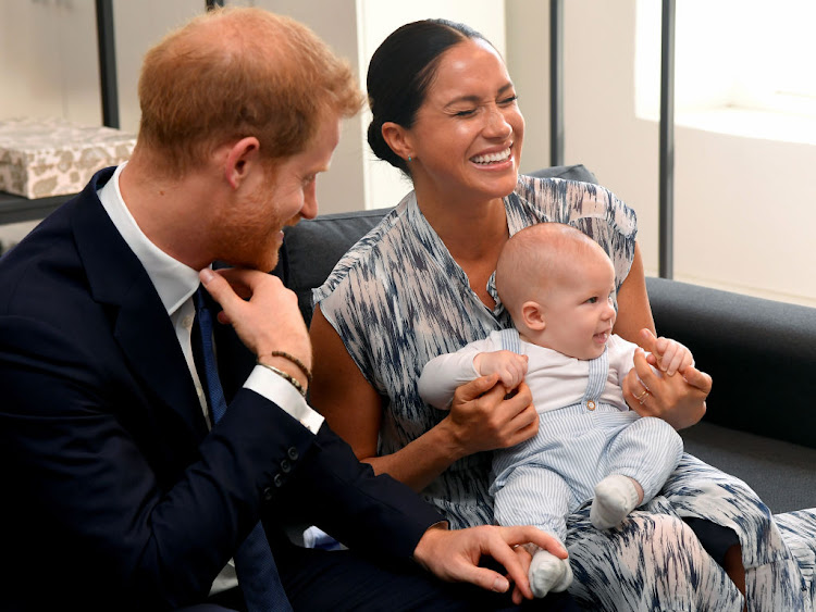 Prince Harry, his wife Meghan Markle and baby Archie during their visit with Archbishop Emeritus Desmond Tutu.