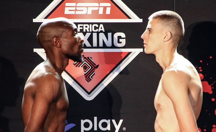 Sinethemba Blom faces off with Kaine Fourie at the weigh-in on Wednesday.