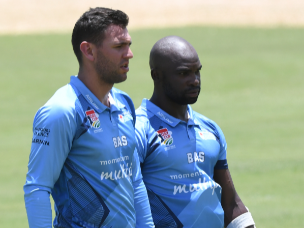 Donovan Ferreira, left, and Junior Dala of the Titans during the CSA One-Day Cup Division 1 match between North West Dragons and Momentum Multiply Titans at JB Marks Oval on December 18 2022 in Potchefstroom.