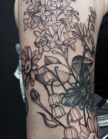 Flowers Around Lily Of The Valley Tattoo