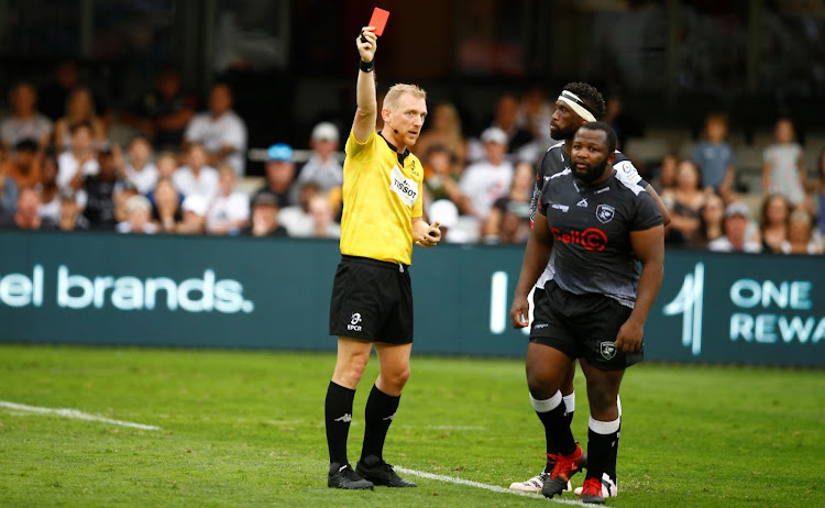 Referee Tual Trainini gives a red card to Sharks prop Ox Nche during the match against the Harlequins at Kings Park in Durban on Saturday. Picture: GALLO IMAGES/STEVE HAAG