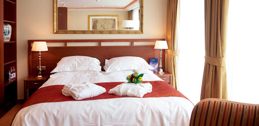 amalegro-stateroom2.jpg - Relax in your stateroom and take in views of stirring landscapes along the riverbanks of France on AmaLegro. 