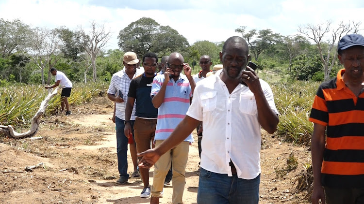 Proximity Point Group CEO Prof Lukas Njenga with members from the Diaspora Community when they toured the site of the proposed city in Kanyumbuni Magarini, Kilifi county