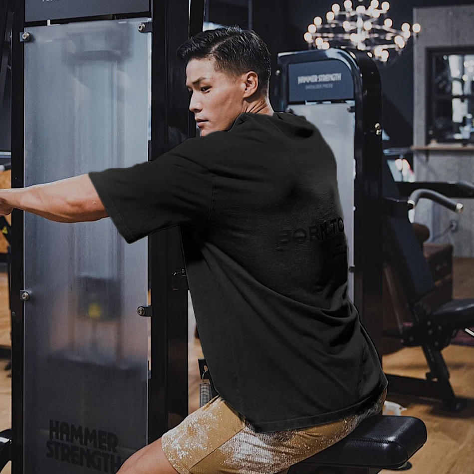 T-shirt de sport homme PrintempsÉté nouvelle col rond coton loisirs running manches courtes. Confort et respirabilité pour vos activités.