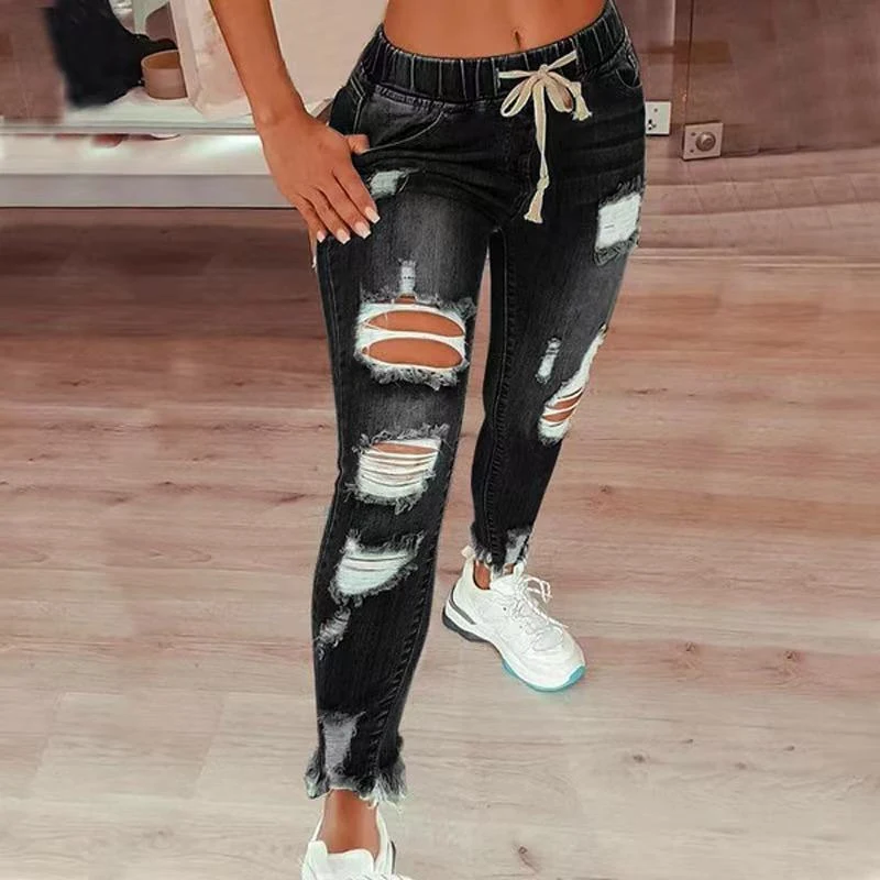 Jeans de mujer de cintura alta con rotos, cintura elástica y cordón, pantalones cómodos y modernos para un look casual y a la moda.