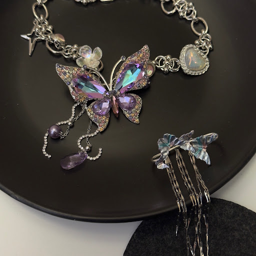Title 7, Heavy Industry Purple Butterfly Necklace, a bea...