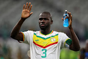 Senegal captain Kalidou Koulibaly applauds fans after their 3-1 Group A match win against Qatar. Senegal meet Ecuador on Tuedsay.