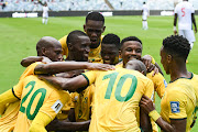 Bafana Bafana celebrate their second goal by Khuliso Mudau (No 20) in their 2026 Fifa World Cup qualifying win against Benin at Moses Mabhida Stadium in Durban on Saturday. 