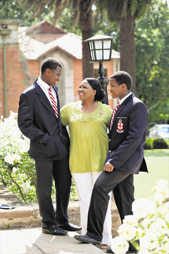 BRIGHT FUTURES: Anele Songca, 14, and his brother Olwethu, 17, with their mother Zola at Michaelhouse in KwaZulu-Natal Picture: JACKIE CLAUSEN