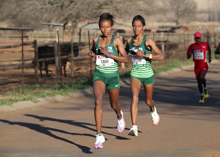 Tadu Nare and Selam Gebre running neck and neck during the Spar 10km Grand Prix race in Tshwane on Saturday.