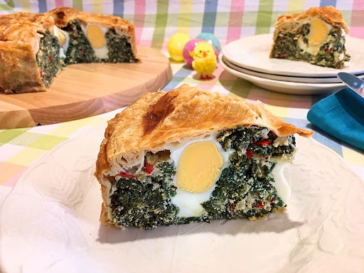 A gorgeous and colorful Italian Easter Pie made with spinach, kale, ricotta, etc., including a few whole eggs.