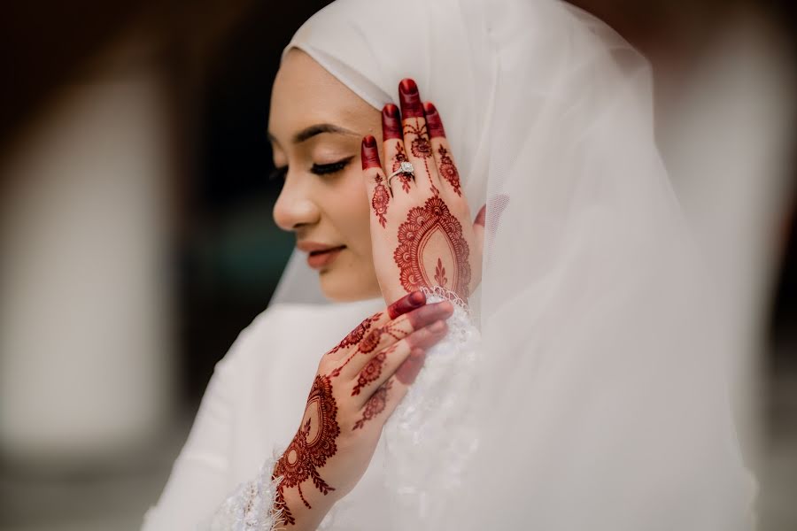 結婚式の写真家Zulfadhli Zainudin (symbiotic)。2023 8月8日の写真