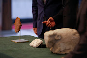 The Gilgamesh Dream Tablet, stolen from Iraq in 1991 and returned after it was seized by the U.S. government, and other artefacts are displayed at the Ministry of Foreign Affairs in Baghdad, Iraq December 7, 2021. 