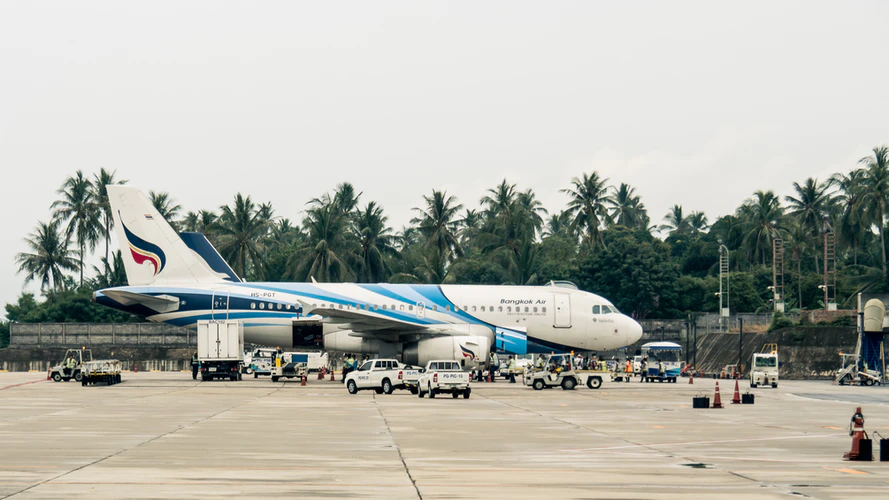 A Bangkok Air airplane at the airport, ready to take passengers on a short ride from Bangkok to Koh Samui.