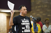 National Press Club Chairman Yusuf Abramjee voicing his concerns at a public hearing regarding the Protection of Information Bill on February 14, 2012 in Mamelodi, South Africa.