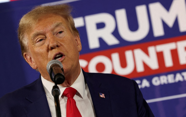 Former US president and Republican presidential frontrunner Donald Trump addresses a rally in Ankeny, Iowa, in the US in December 2023. Picture: REUTERS/CARLOS BARRIA