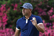 Brooks Koepka of the US celebrates a birdie on the 13th hole during first round play of the Masters golf tournament at Augusta National Golf Club in Augusta, Georgia, on April 11, 2019. 