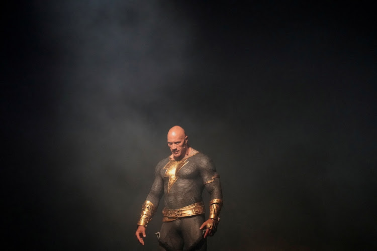 Actor Dwayne Johnson appears in a costume during a panel promoting the DC Comics superhero film Black Adam at Comic-Con International in San Diego, California.