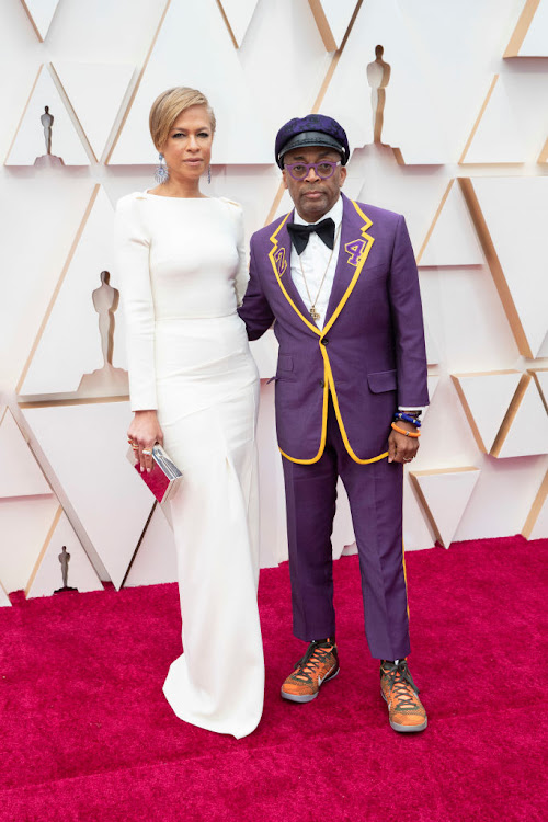 Spike Lee, pictured with his wife Tonya Lewis Lee, in a custom Gucci suit at the 2020 Oscars.