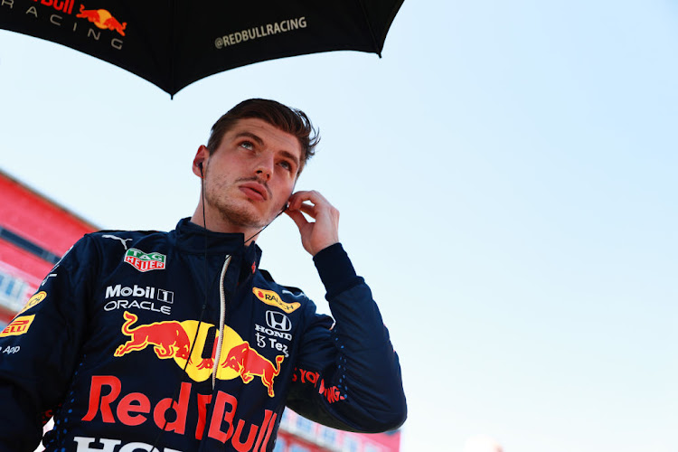 Max Verstappen prepares to drive on the grid before the F1 Grand Prix of Great Britain at Silverstone on July 18, 2021 in Northampton, England.