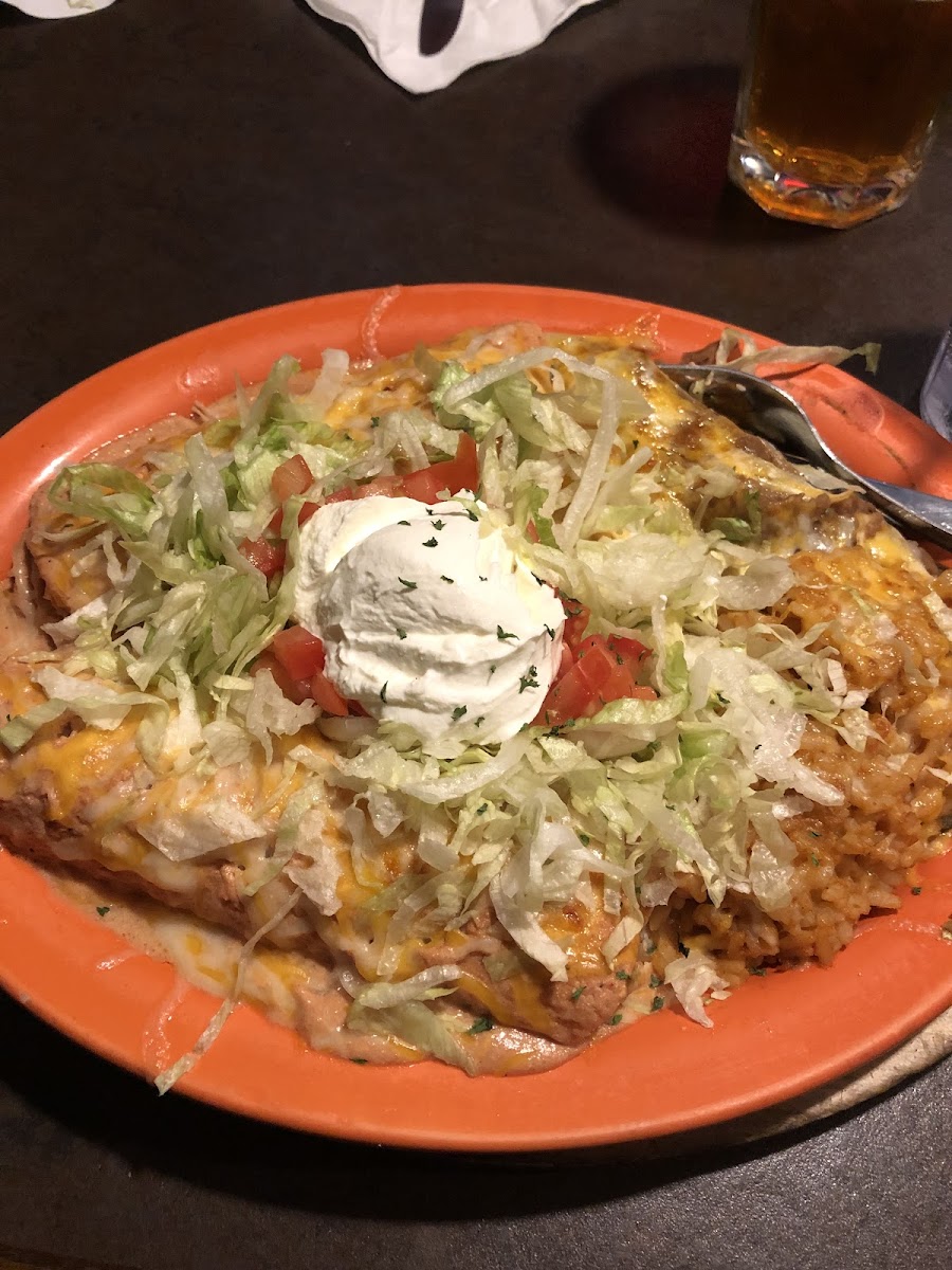 2 chicken enchiladas with beans and rice