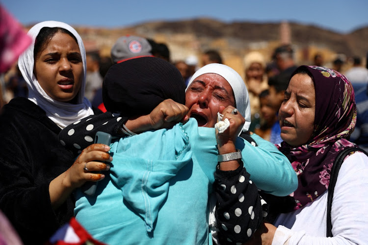 People react during the funeral of two victims of the deadly earthquake, in Moulay Brahim, Morocco, September 10 2023. Picture: HANNAH MCKAY/REUTERS