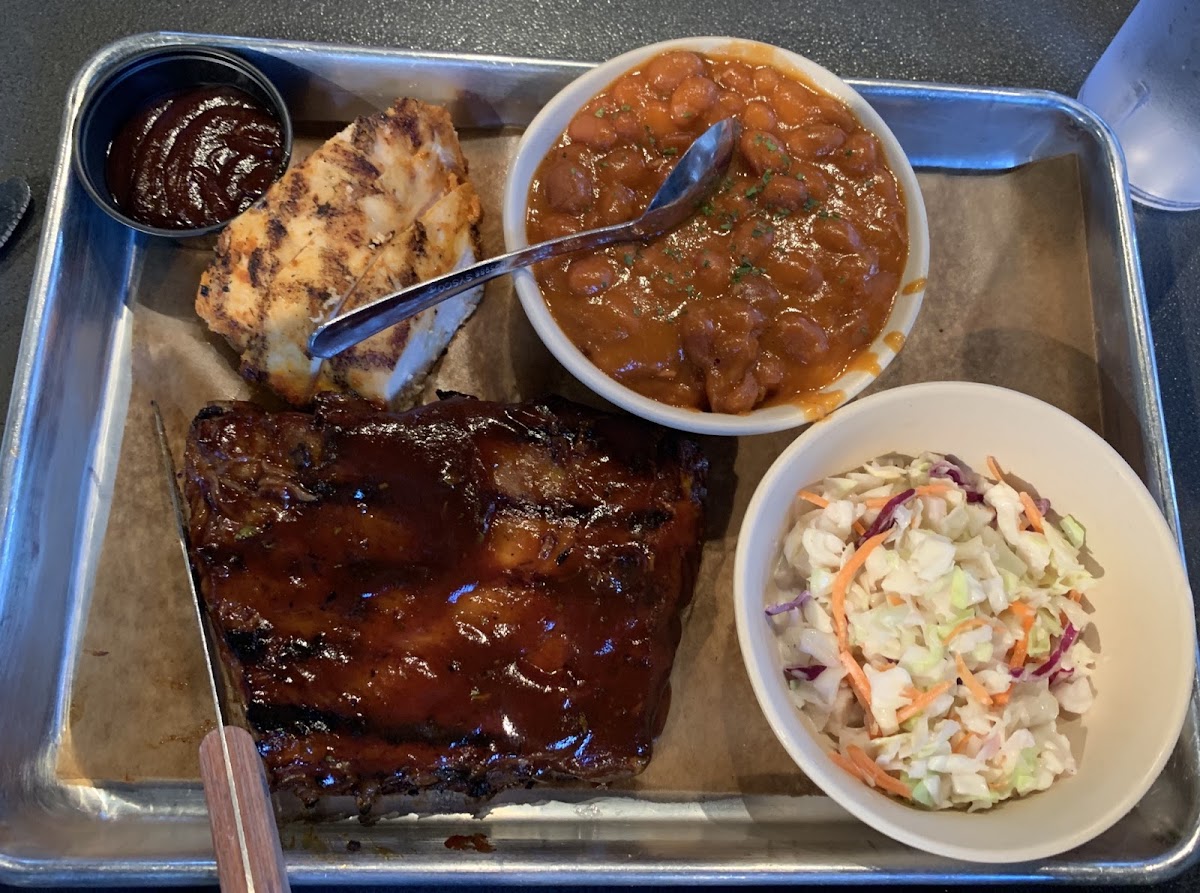 BBQ ribs, chicken, BBQ beans and coleslaw.