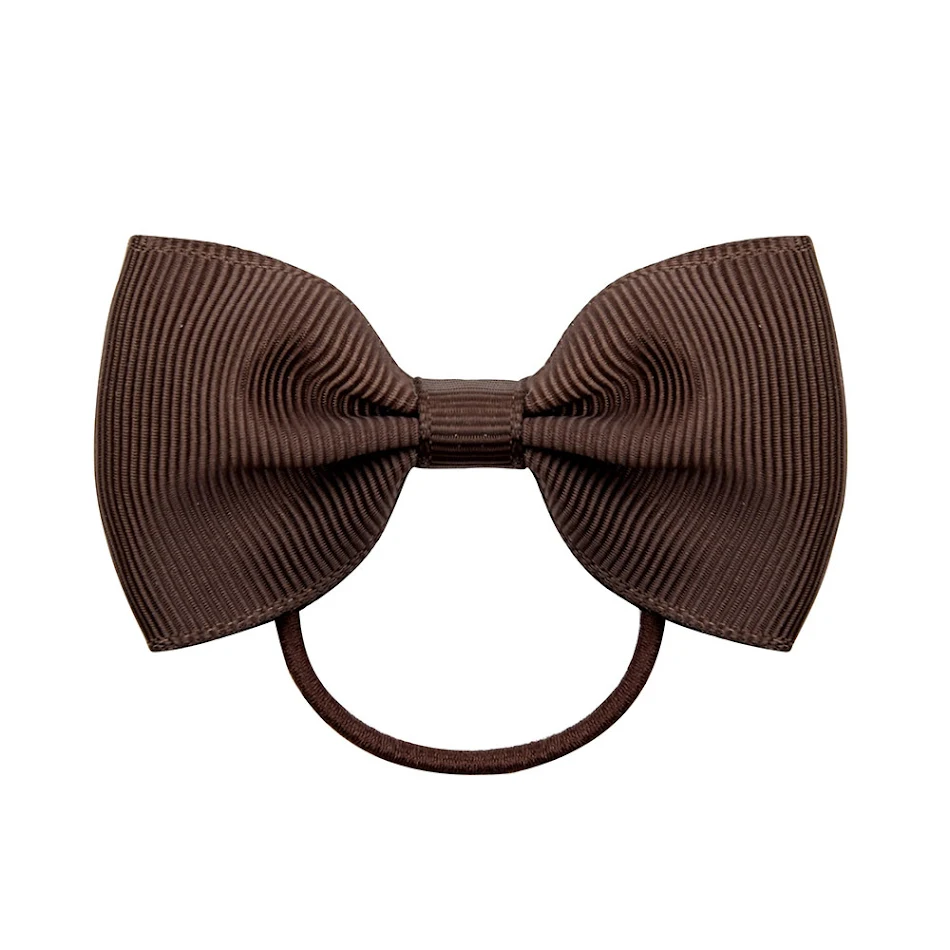 Elastische haarband met strik voor kinderen, schattig en lief. Gemakkelijk te gebruiken, perfect voor het haar van kleine meisjes.