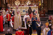 Britain's King Charles walks in the Coronation Procession after his coronation ceremony at Westminster Abbey in London, Britain, May 6, 2023. 