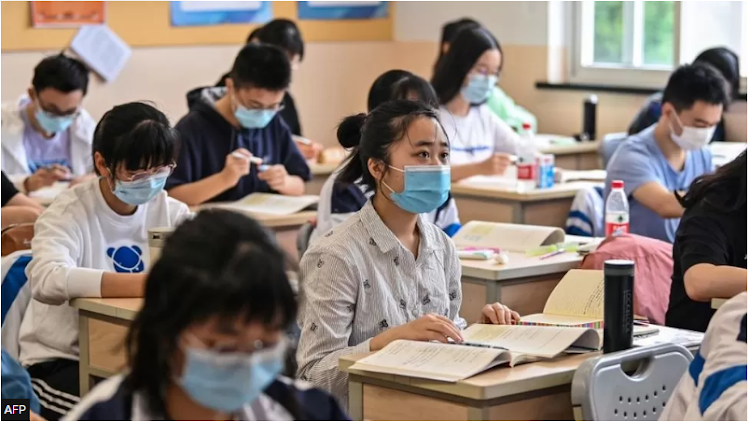 Students pictured in a school classroom in Shanghai in 2020