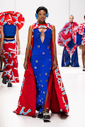 Model walks the Reina Majoka SA Fashion Week Spring Summer 2024 runway in a collection inspired by the poison dart frog.