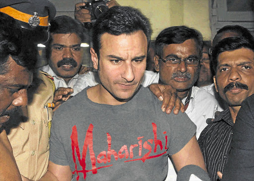 Saif Ali Khan is escorted by Mumbai police this week. The Bollywood star has been charged with assaulting two diners at the Taj Mahal Palace hotel in Mumbai.