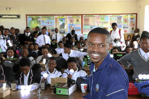 Pilot Sipho Mangesi and some of the grade 12 pupils from four schools around Ndabakazi area in Eastern Cape. / SUPPLIED