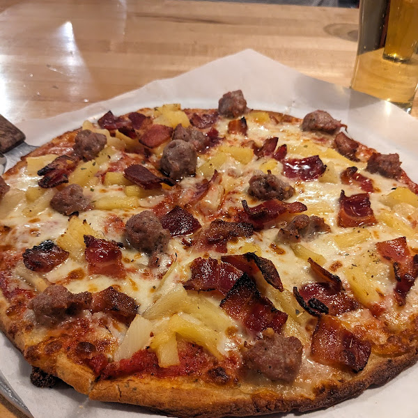 Amaaazing gf pizza! My favorite combo -- their homemade sausage, bacon and pineapple. They'll make it any way you like!