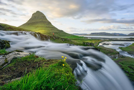 Visit the Kirkjufellsfoss waterfall on the Snaefellsnes peninsula of Iceland.