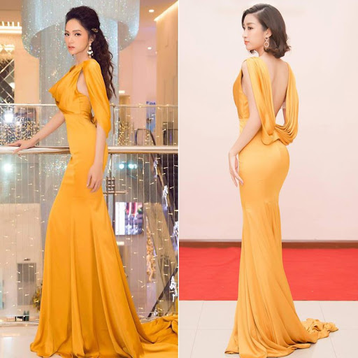 Chẳng biết là do <b>Hương Giang</b> và <b>Đỗ Mỹ Linh</b> hay 2 stylist của họ cùng chung ý tưởng mà đã tạo nên màn “đụng hàng” đầm dạ hội đuôi cá, khoe lưng trần này.