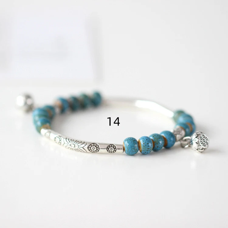 Title 14, Originele handgemaakte kleine keramische armban...
