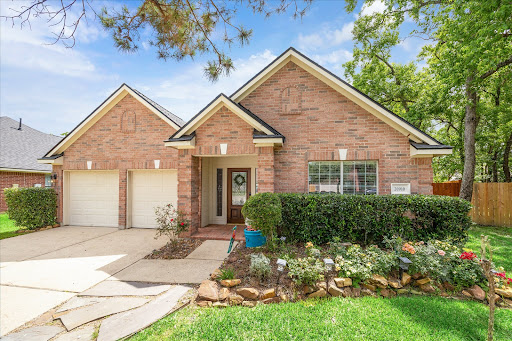 Brick house with double garage and garden in this luxury property for sale in Spring ($365,000)