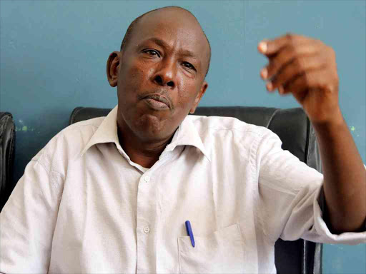 Abdi Ibrahim speaks during a Reuters interview after burying the hand of his sister Asha believed to have been killed during an explosion in KM4 street in the Hodan district in Mogadishu, October 17, 2017. /REUTERS